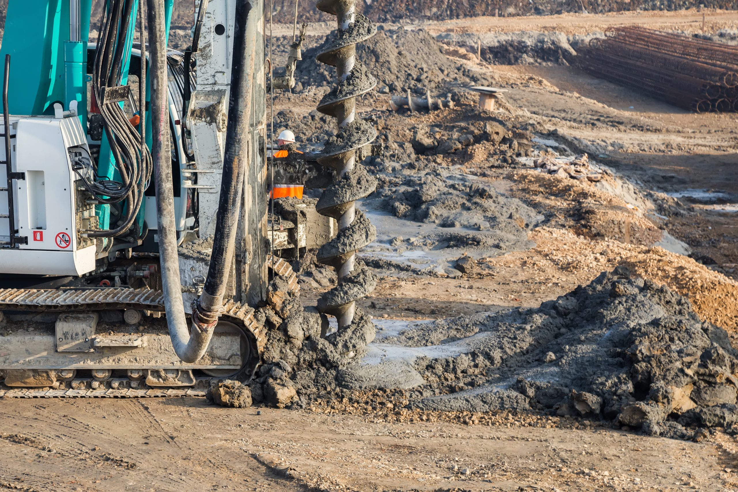 Drilling,Tractor,Installs,Concrete,Piles,In,The,Ground,At,Construction