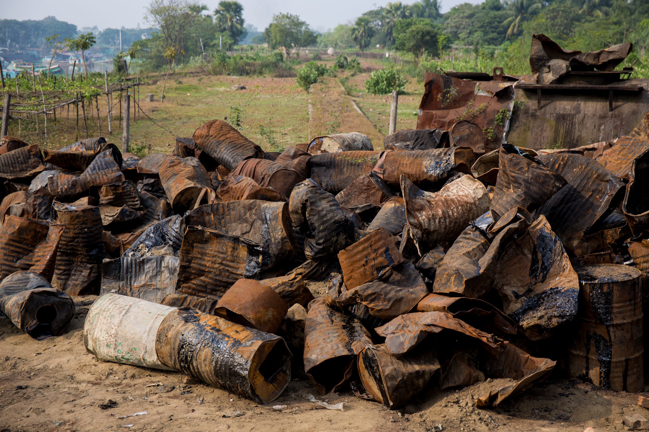 Rusted,Barrels,Leaking,Oil,Polluting,The,Countryside,Of,Dhaka.